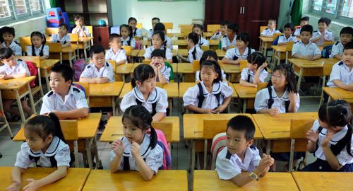 Học sinh lớp 1 trường Tiểu học Cửu Long trong ngày tựu trường. Ảnh: Mạnh Tùng.